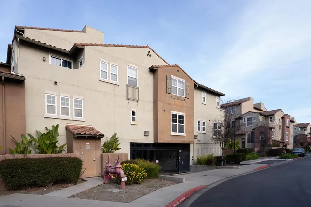a view of a house with a street