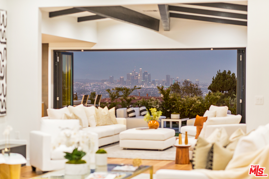 4132 Punta Alta Drive Los Angeles, CA 90008 - Photo 2 of 43 a living room with furniture and a potted plant