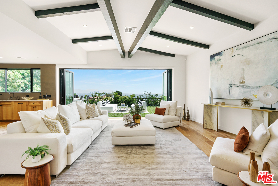 4132 Punta Alta Drive Los Angeles, CA 90008 - Photo 12 of 43 a living room with furniture and a large window
