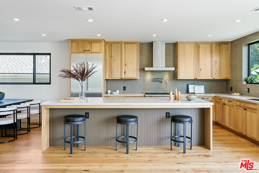 4132 Punta Alta Drive Los Angeles, CA 90008 - Photo 17 of 43 a kitchen with a sink cabinets and window
