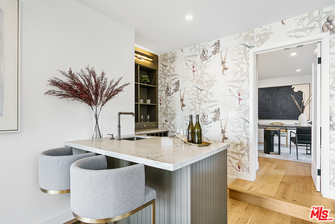 4132 Punta Alta Drive Los Angeles, CA 90008 - Photo 23 of 43 a kitchen with a sink and a refrigerator