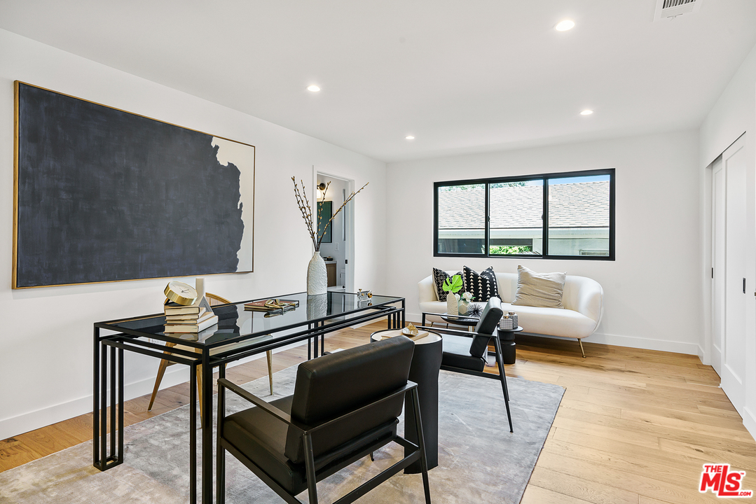 4132 Punta Alta Drive Los Angeles, CA 90008 - Photo 26 of 43 a living room with furniture and a window
