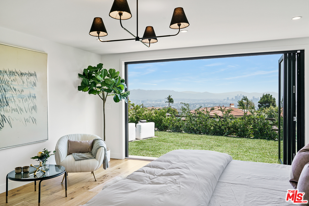 4132 Punta Alta Drive Los Angeles, CA 90008 - Photo 31 of 43 a living room with patio furniture and garden