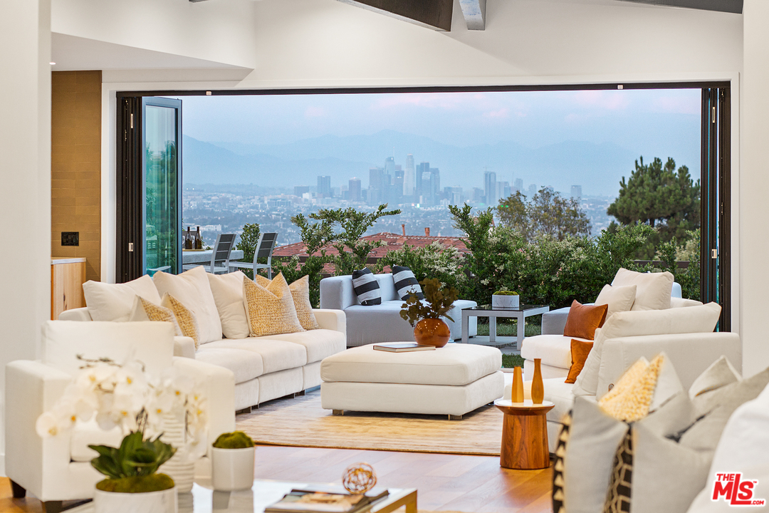 4132 Punta Alta Drive Los Angeles, CA 90008 - Photo 6 of 43 a living room with furniture and a large window