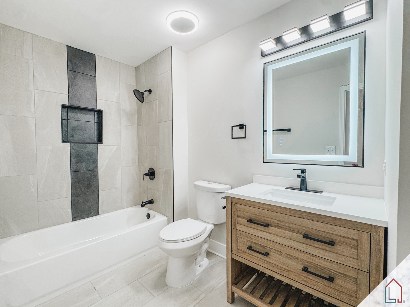 864 Berkshire Place Crete, IL 60417 - Photo 14 of 23 a bathroom with a sink toilet vanity and shower