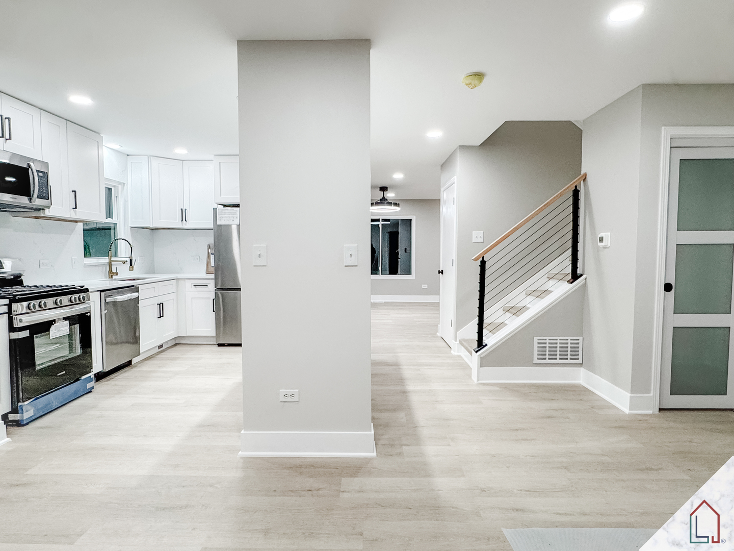 864 Berkshire Place Crete, IL 60417 - Photo 3 of 23 a view of a kitchen with a sink and a stove top oven