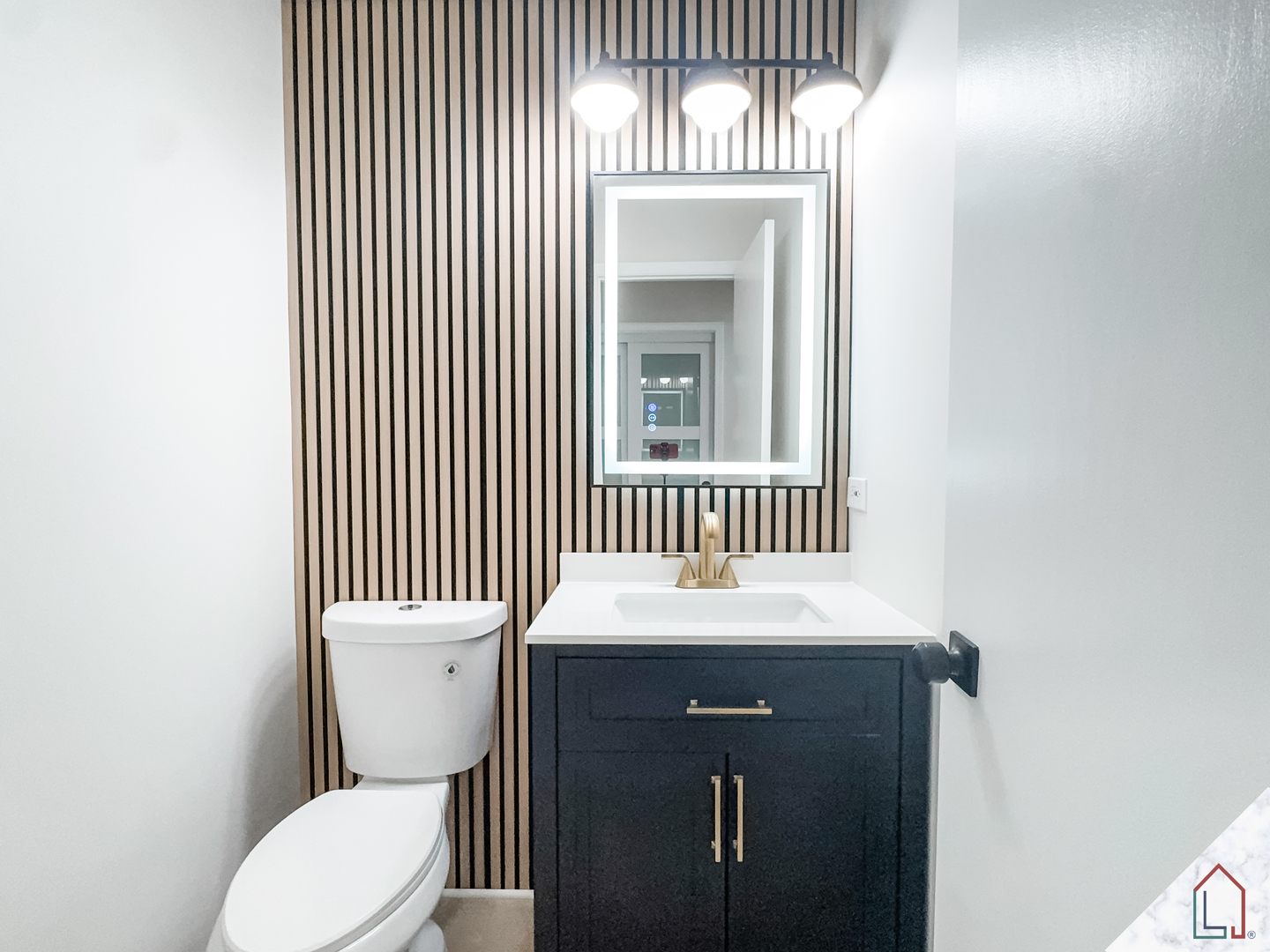 864 Berkshire Place Crete, IL 60417 - Photo 7 of 23 a bathroom with a toilet sink and mirror