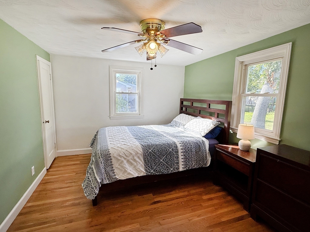 11 Webb Road Sharon, MA 02067 - Photo 11 of 19 a bedroom with a bed and a window