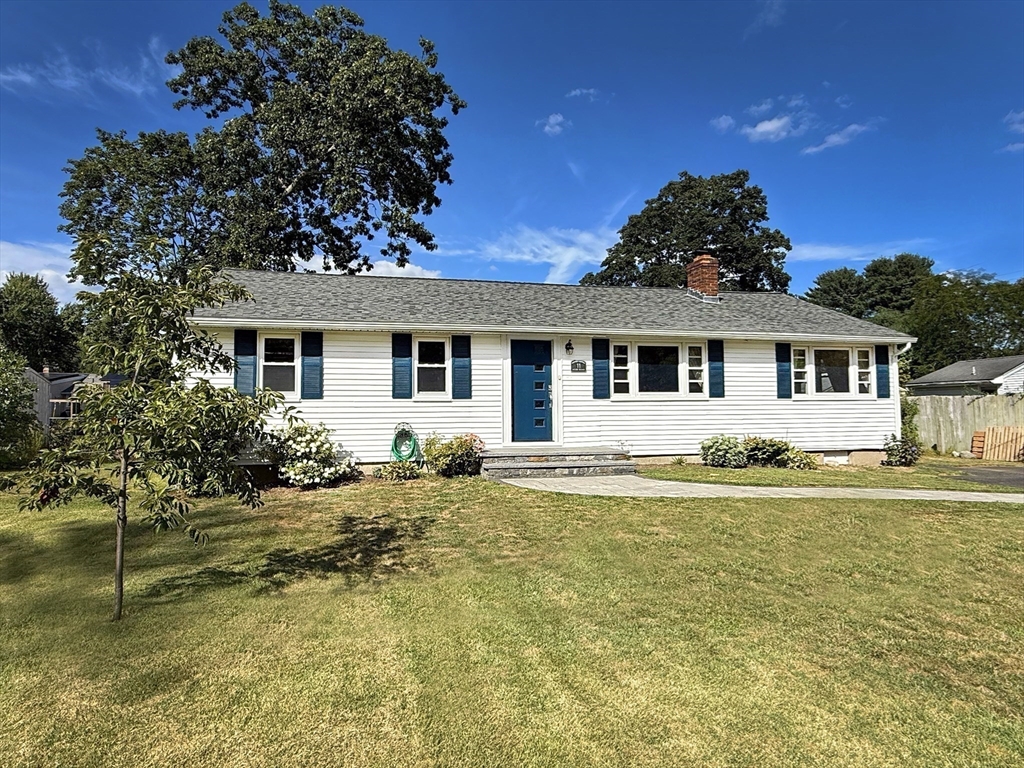11 Webb Road Sharon, MA 02067 - Photo 2 of 19 a front view of a house with a yard