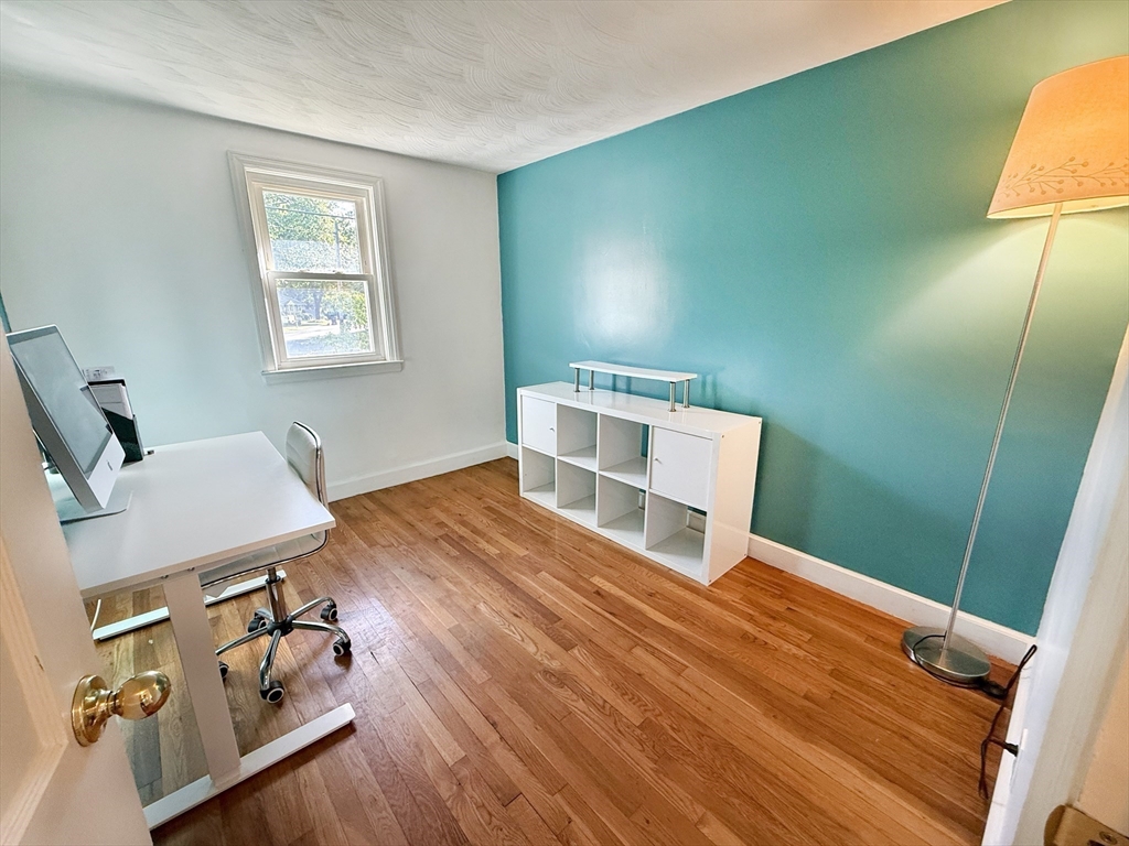 11 Webb Road Sharon, MA 02067 - Photo 9 of 19 a room with furniture and a wooden floor
