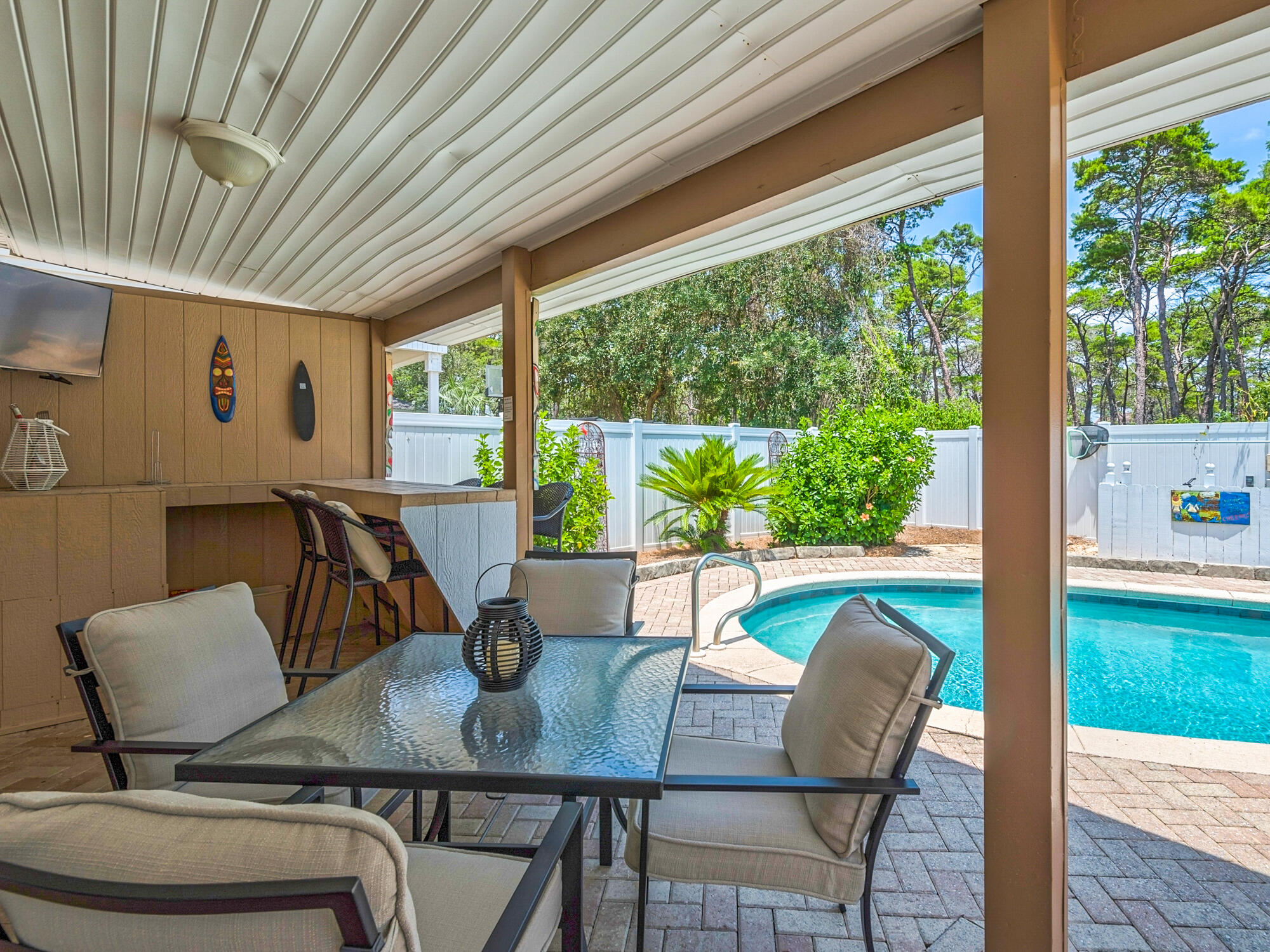 4587 Woodwind Drive Destin, FL 32541 - Photo 21 of 24 a view of a dining room with furniture window and outside view