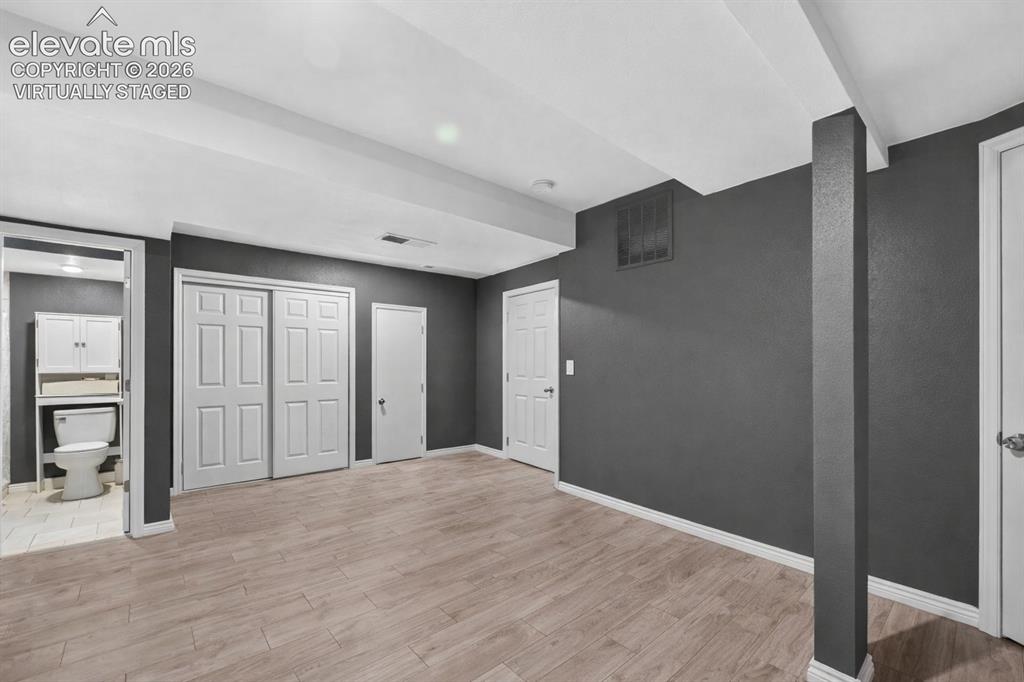 2141 Legacy Ridge View, Unit 109 Colorado Springs, CO 80910 - Photo 15 of 23 a view of a big room with closet and bathroom