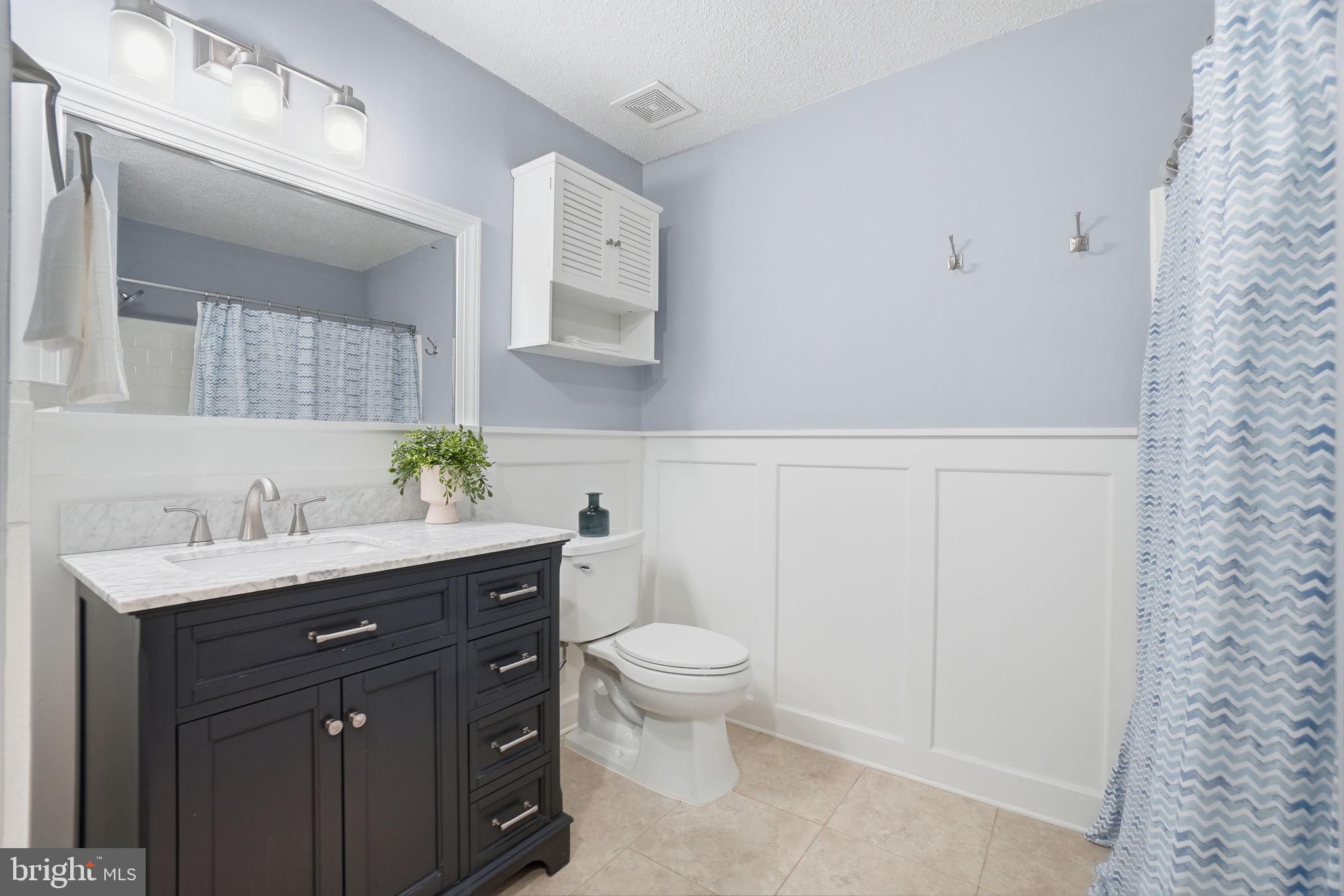 20960 Timber Ridge Terrace, Unit 303 Ashburn, VA 20147 - Photo 17 of 32 Bathroom with bathtub