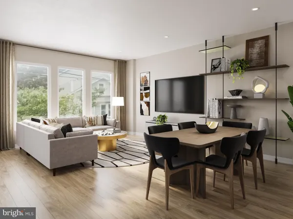 a living room with furniture a flat screen tv and a large window