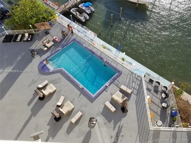 a view of building with parking area