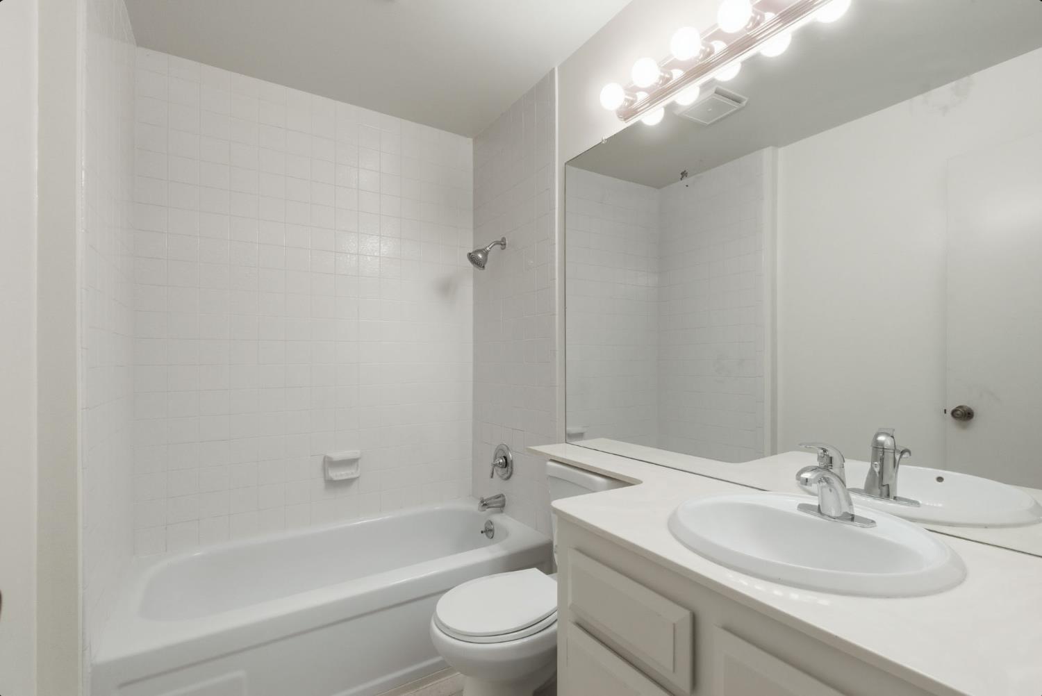 524 Hartnell Place Sacramento, CA 95825 - Photo 16 of 25 a bathroom with a sink a toilet and shower