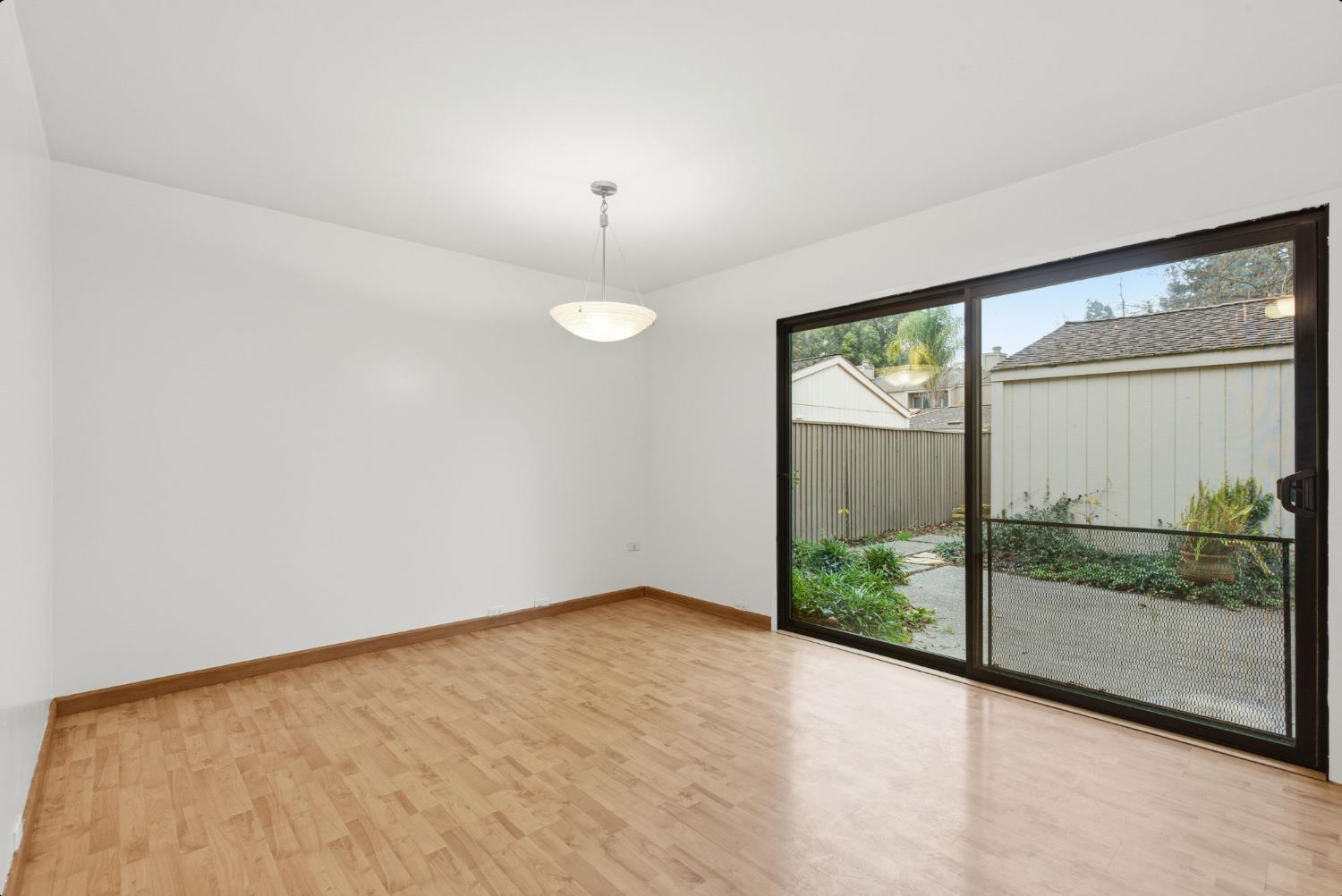 524 Hartnell Place Sacramento, CA 95825 - Photo 8 of 25 a view of an empty room with windows