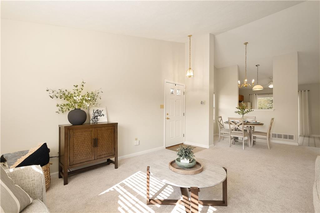 146 Sedeca Drive Canonsburg, PA 15317 - Photo 13 of 41 a living room with furniture and flowers
