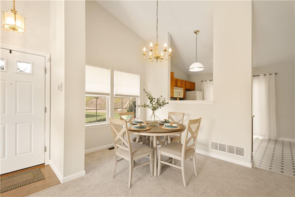 146 Sedeca Drive Canonsburg, PA 15317 - Photo 5 of 41 a dining room with furniture a chandelier and a window