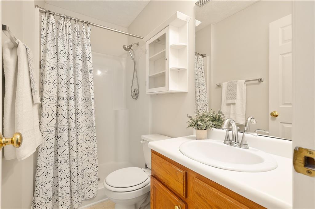 146 Sedeca Drive Canonsburg, PA 15317 - Photo 8 of 41 a bathroom with a sink toilet a mirror and shower