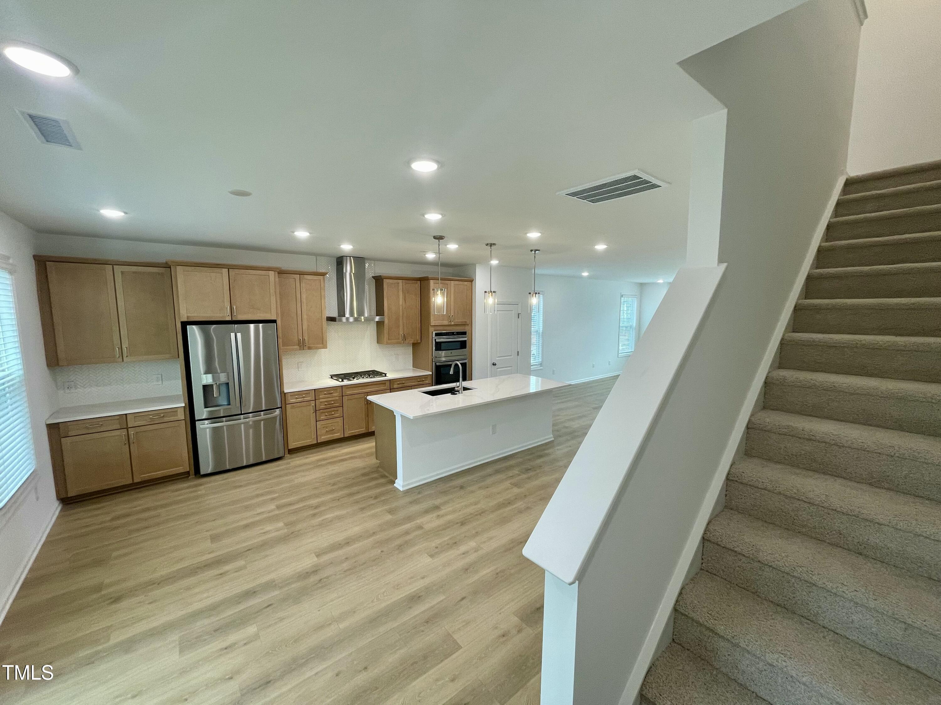 2109 Lambert Road, Unit 65 Cary, NC 27519 - Photo 32 of 87 22. rear stairway to upper level