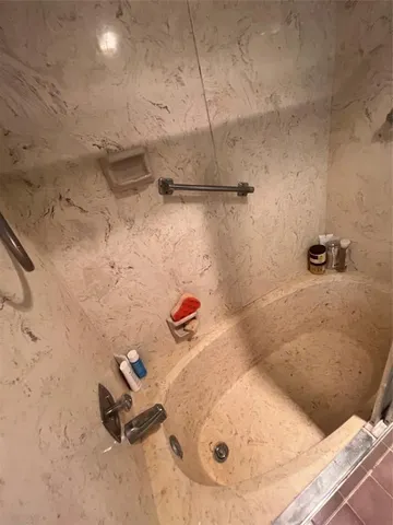 a view of a patio with a table chairs and a backyard