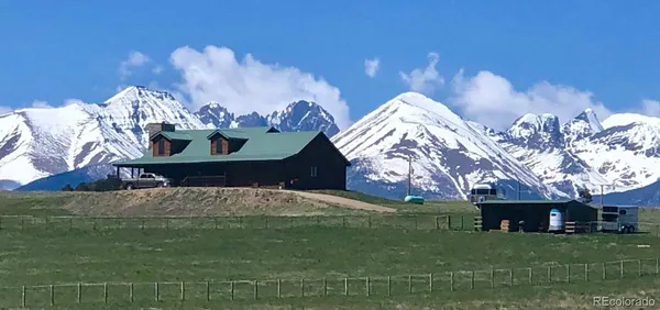 a view of a table and chairs in roof deck