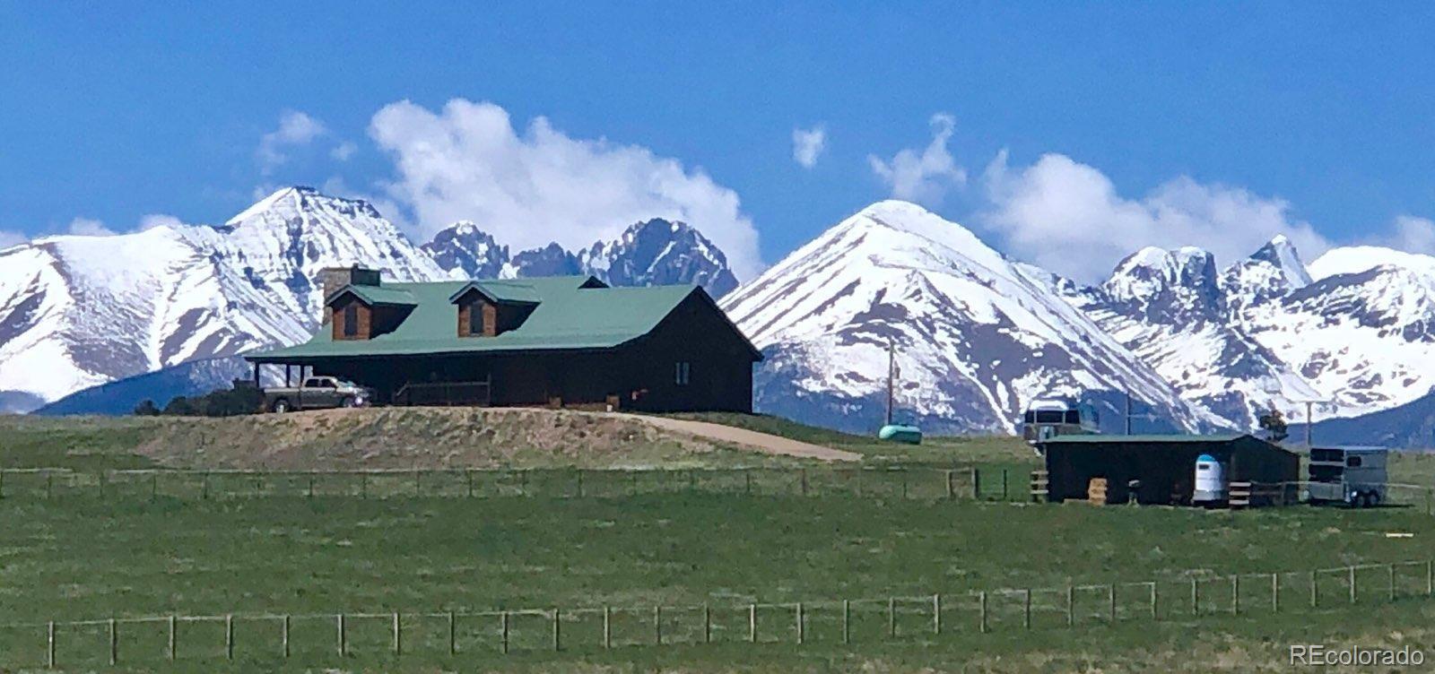 a view of a table and chairs in roof deck