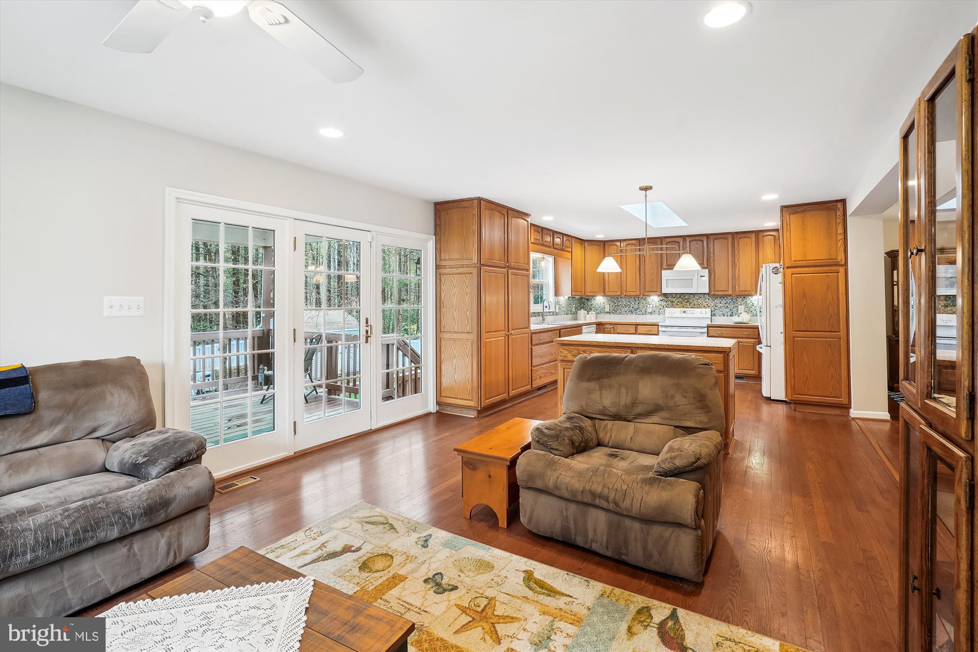 6957 Conservation Drive Springfield, VA 22153 - Photo 13 of 64 a living room with furniture and a large window
