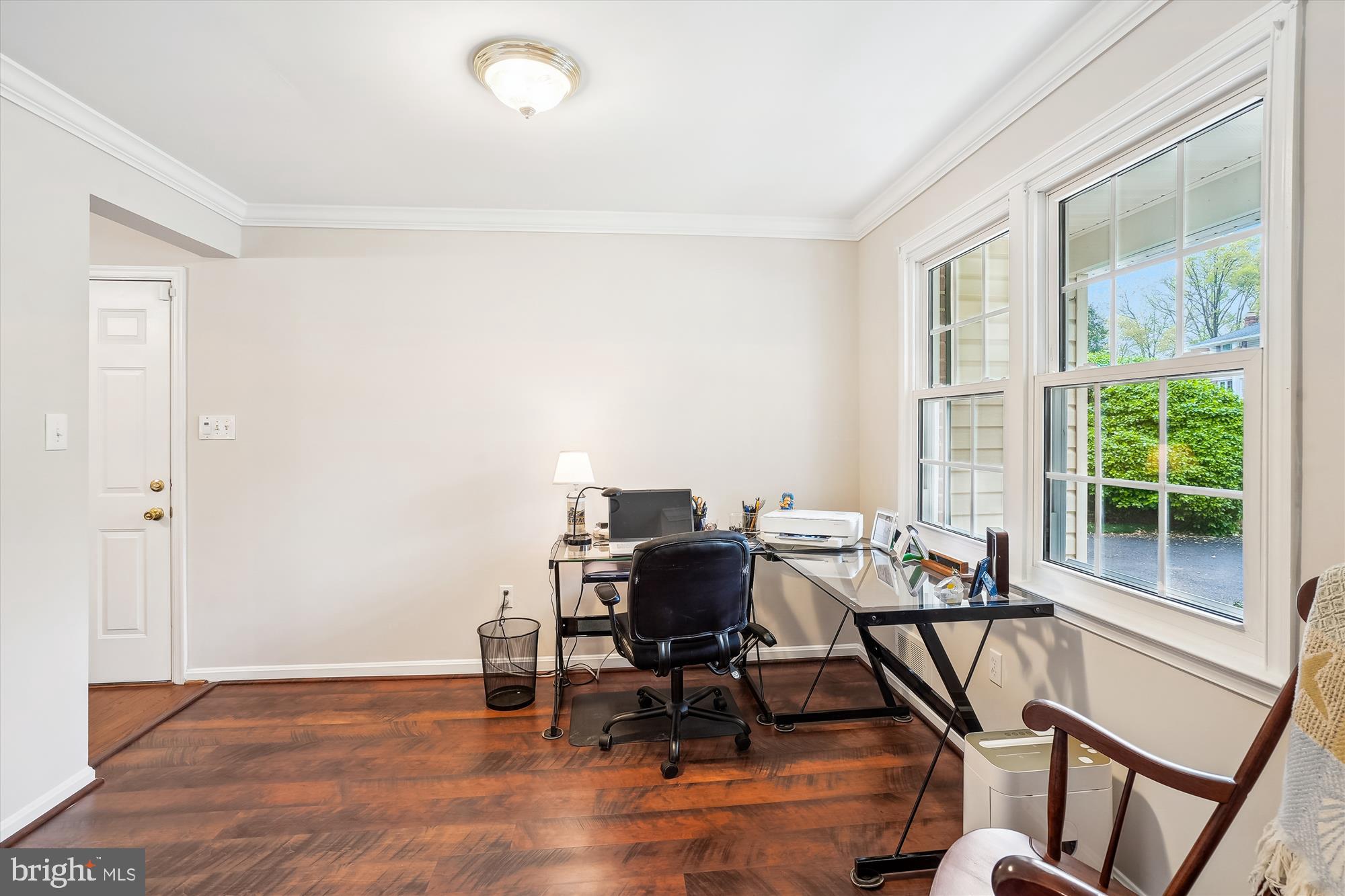 6957 Conservation Drive Springfield, VA 22153 - Photo 26 of 64 a view of a workspace with furniture and a window