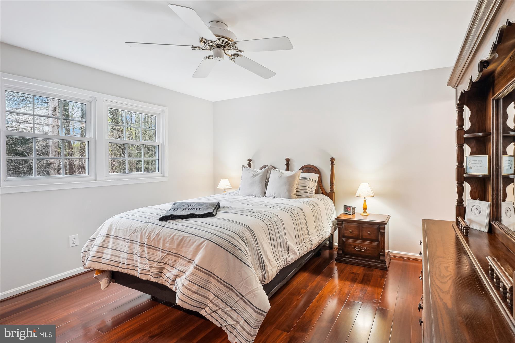 6957 Conservation Drive Springfield, VA 22153 - Photo 28 of 64 a bedroom with bed and a window