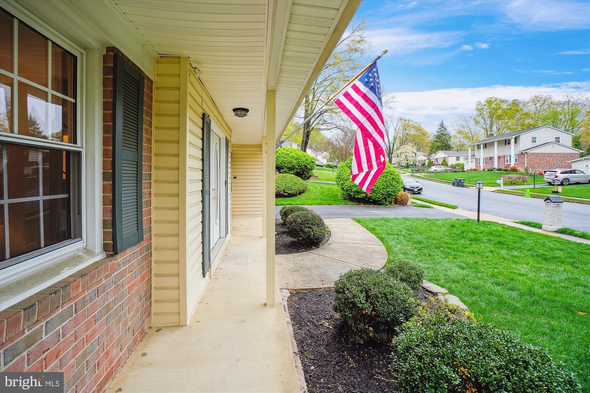 6957 Conservation Drive Springfield, VA 22153 - Photo 3 of 64 Front porch, walkway, driveway and street views