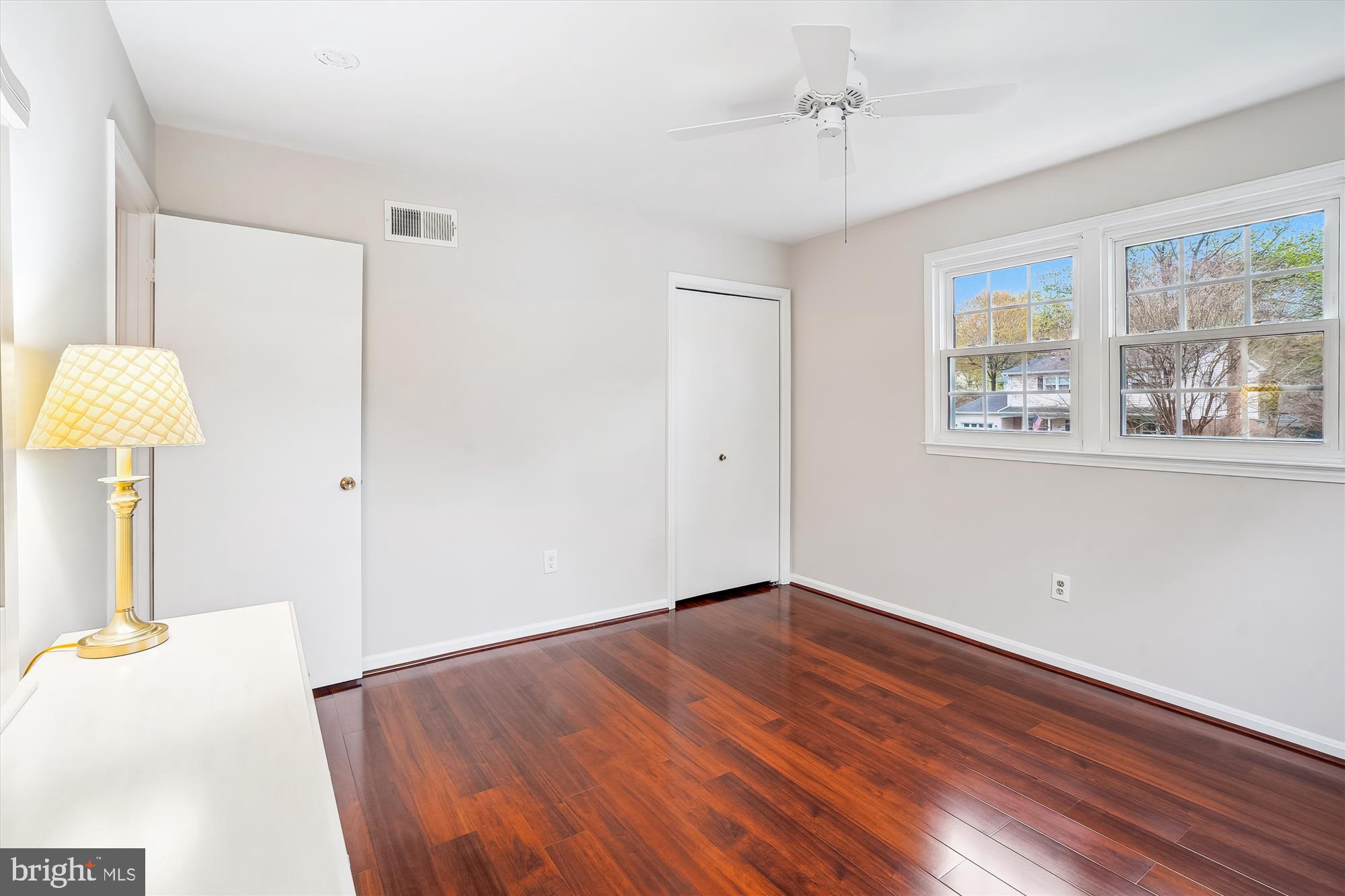 6957 Conservation Drive Springfield, VA 22153 - Photo 41 of 64 a view of empty room with wooden floor