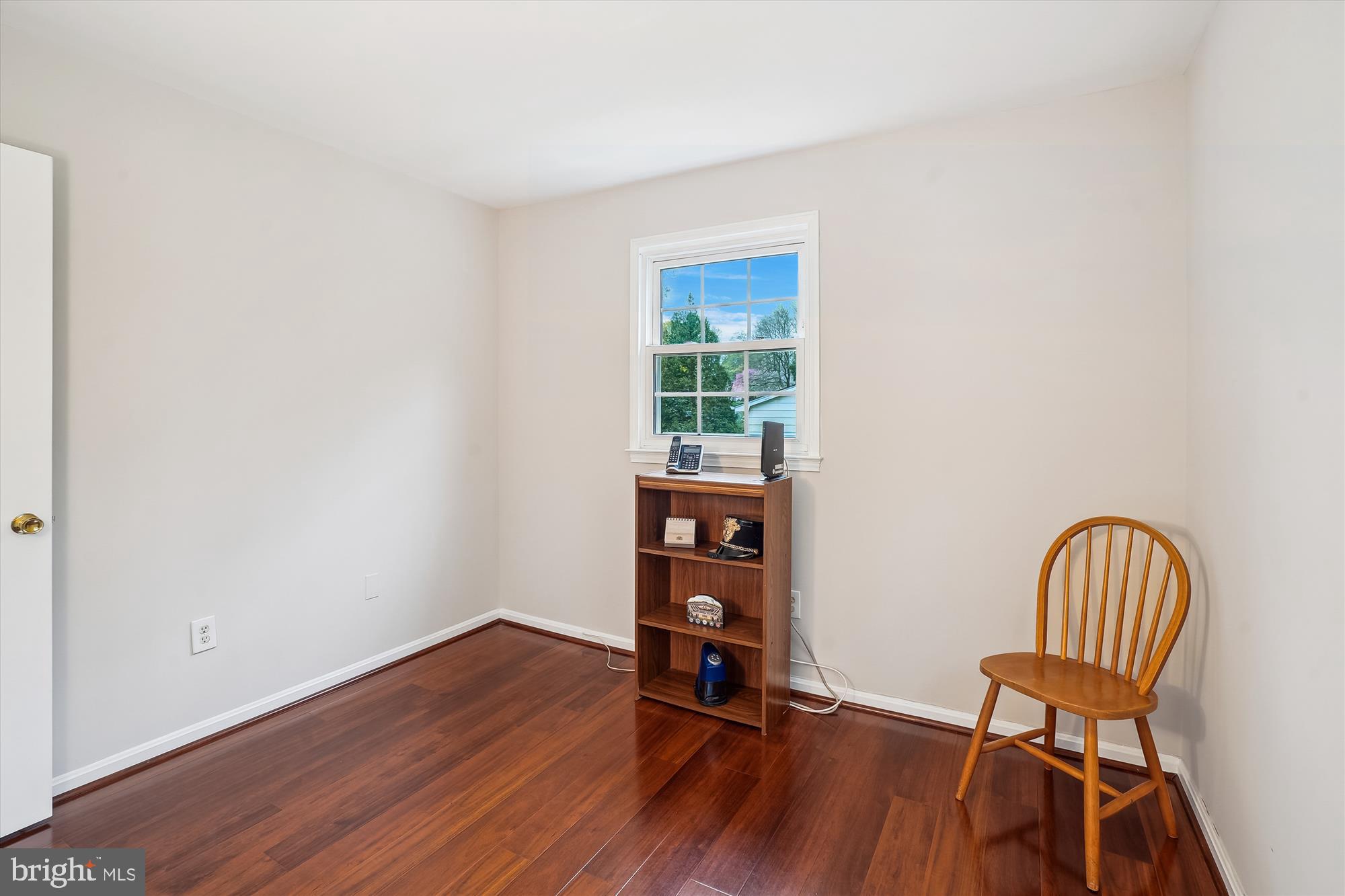 6957 Conservation Drive Springfield, VA 22153 - Photo 43 of 64 a view of a room with wooden floor lounge chair and windows