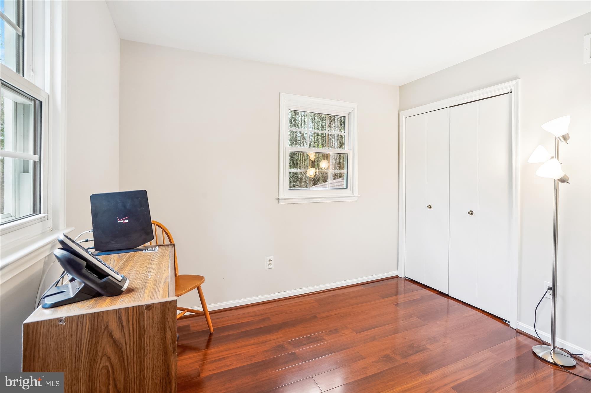 6957 Conservation Drive Springfield, VA 22153 - Photo 44 of 64 a view of workspace with wooden floor windows