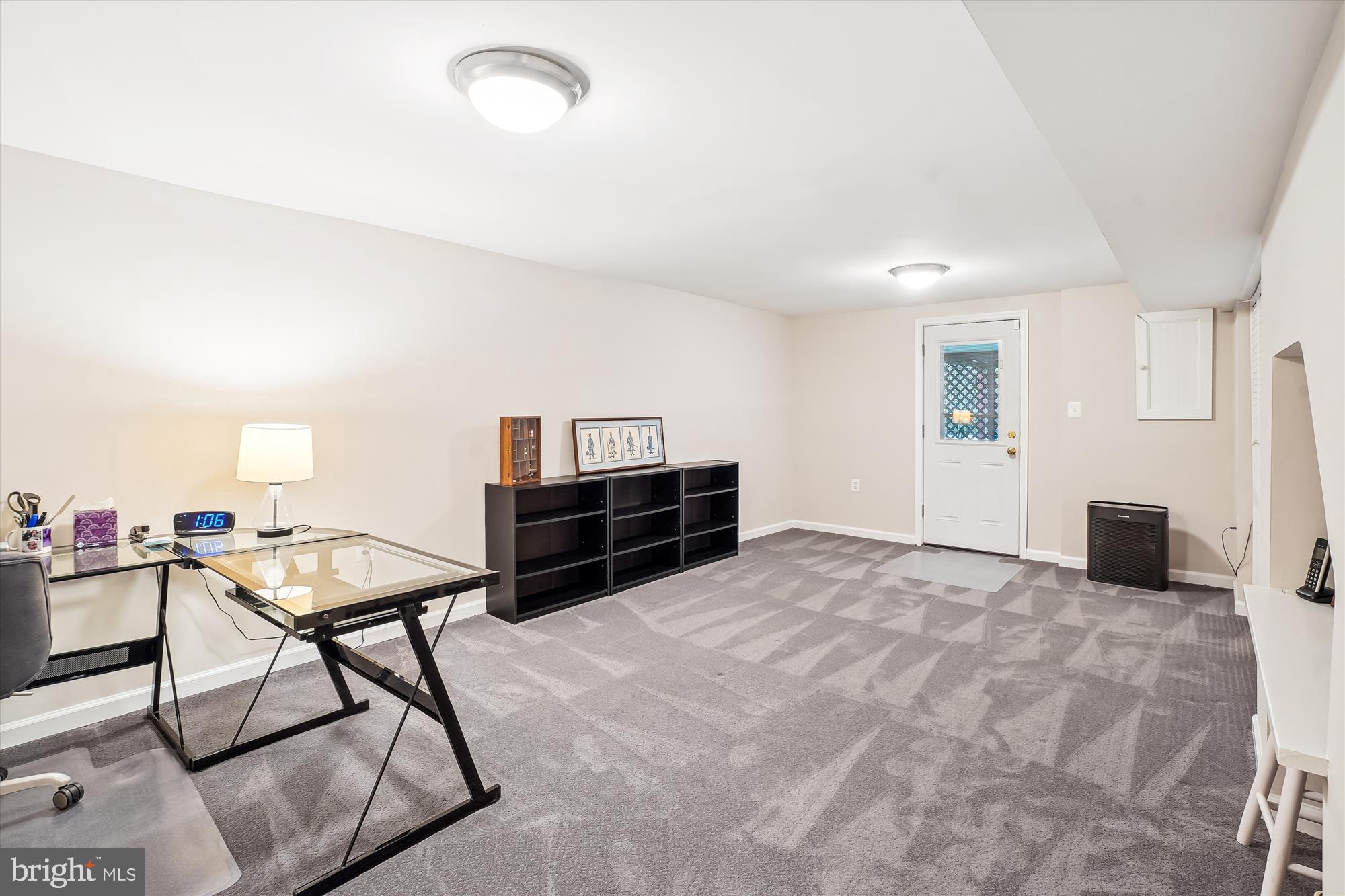 6957 Conservation Drive Springfield, VA 22153 - Photo 46 of 64 a room with furniture and a window