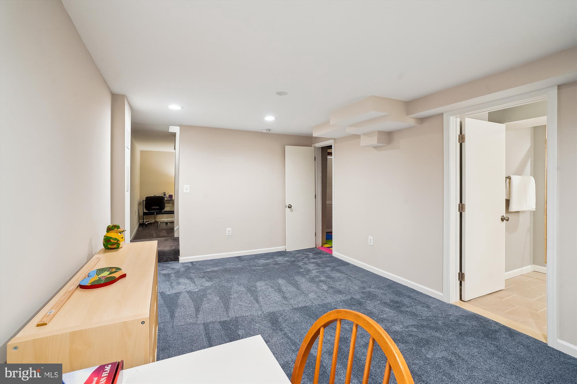 6957 Conservation Drive Springfield, VA 22153 - Photo 52 of 64 a view of an entryway with wooden floor