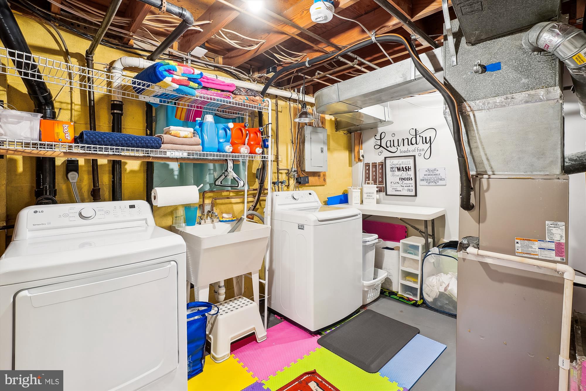 6957 Conservation Drive Springfield, VA 22153 - Photo 55 of 64 a utility room with dryer and washer