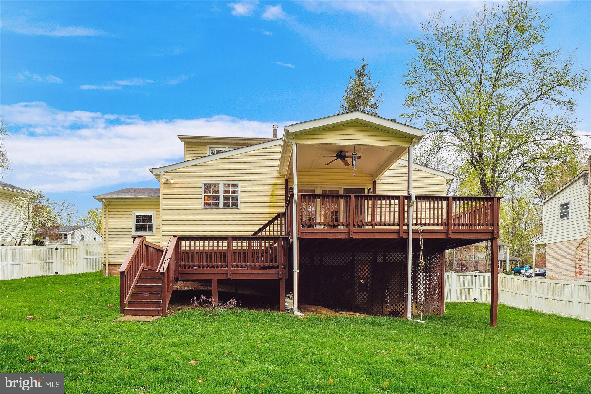 6957 Conservation Drive Springfield, VA 22153 - Photo 58 of 64 a view of a house with a yard