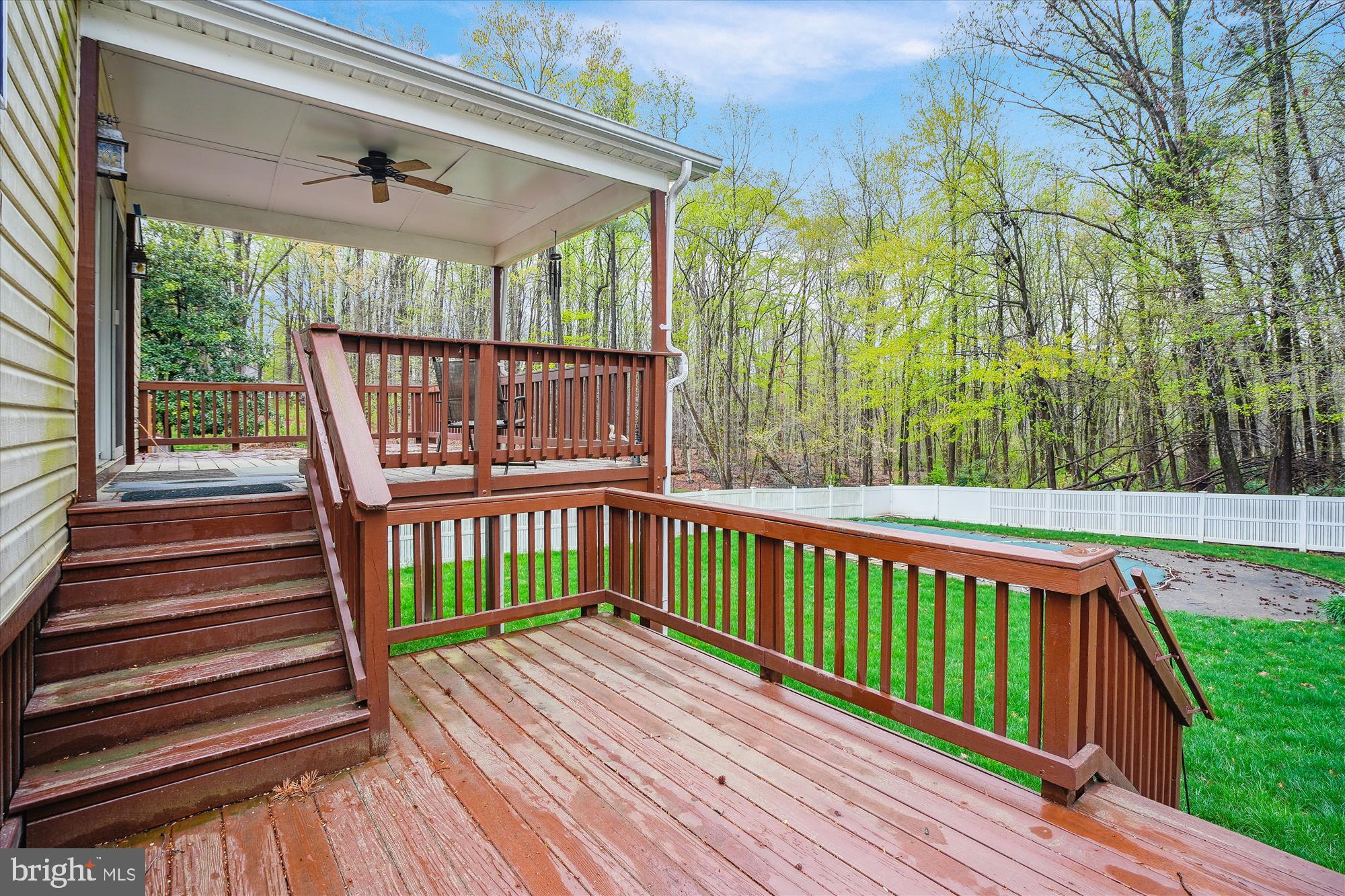 6957 Conservation Drive Springfield, VA 22153 - Photo 61 of 64 Tiered wood deck overlooking backyard