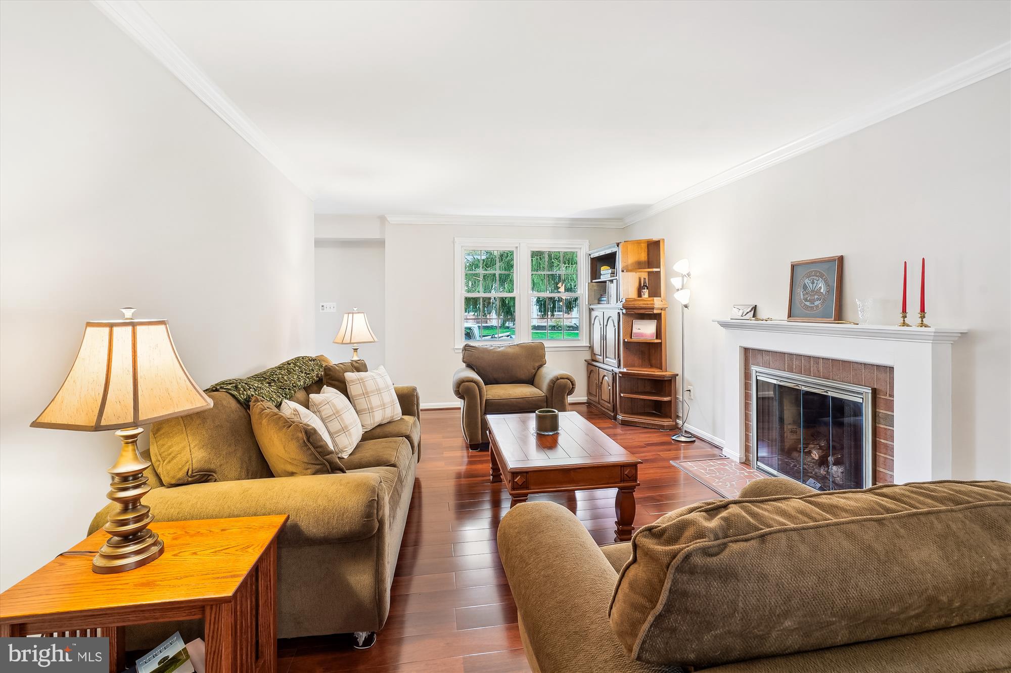 6957 Conservation Drive Springfield, VA 22153 - Photo 8 of 64 a living room with furniture and a fireplace