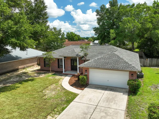 a house view with a garden space