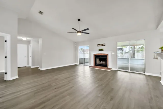 a kitchen with a sink and stainless steel appliances
