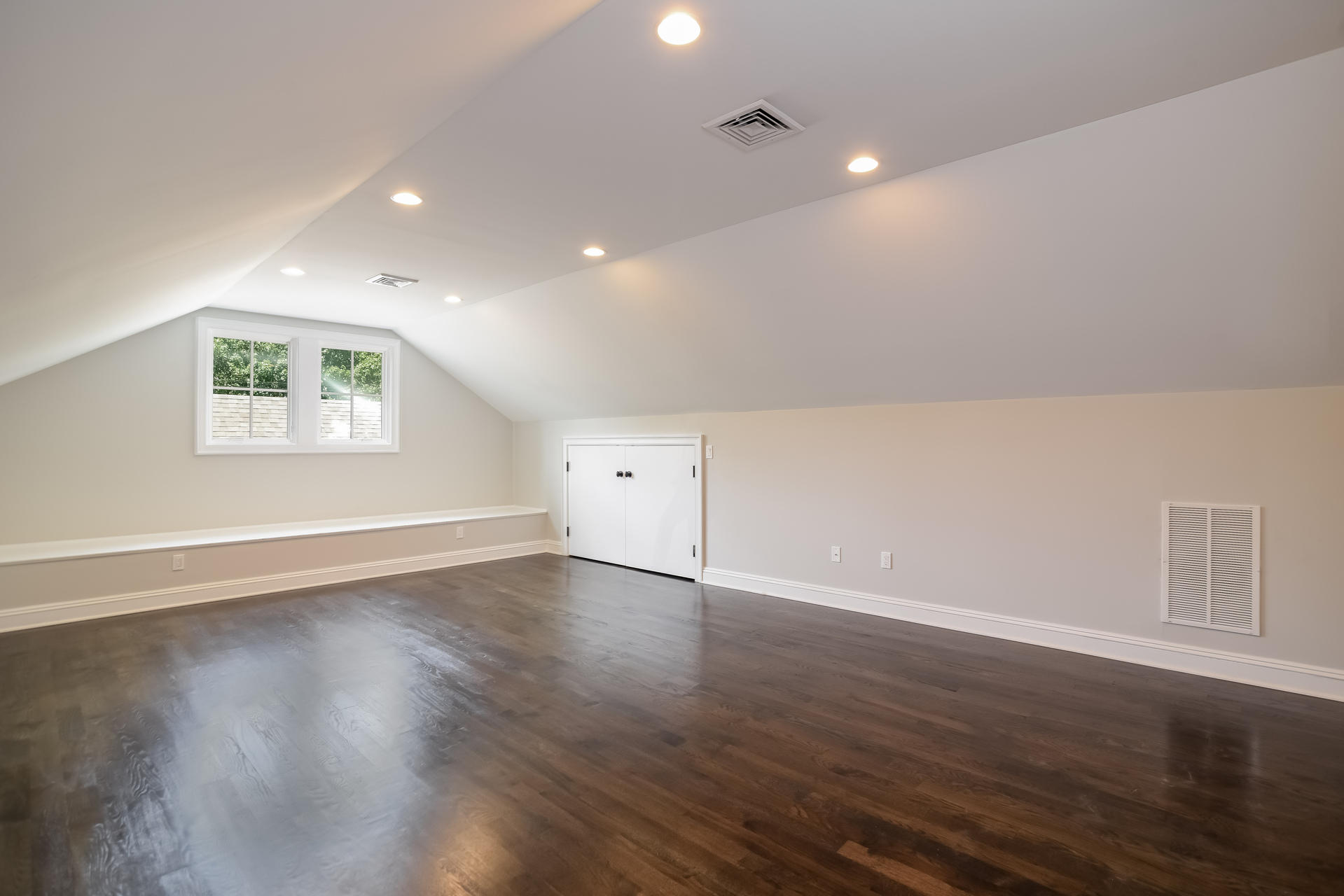 2 Deerfield Road Darien, CT 06820 - Photo 22 of 30 an empty room with wooden floor and windows