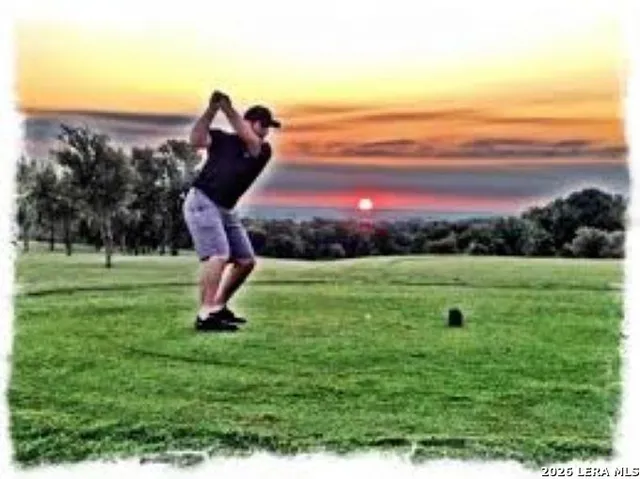 a view of a lake with a big yard