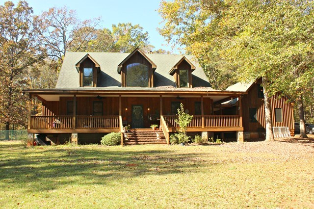 a view of a house with a swimming pool