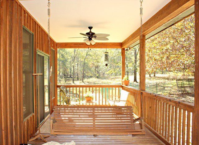683 Sanders Road Macon, GA 31210 - Photo 15 of 19 a view of a porch with wooden floor and outdoor space