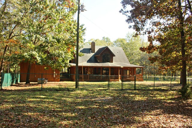 683 Sanders Road Macon, GA 31210 - Photo 19 of 19 a front view of a house with a yard