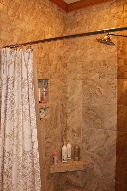 683 Sanders Road Macon, GA 31210 - Photo 9 of 19 a bathroom with a shower