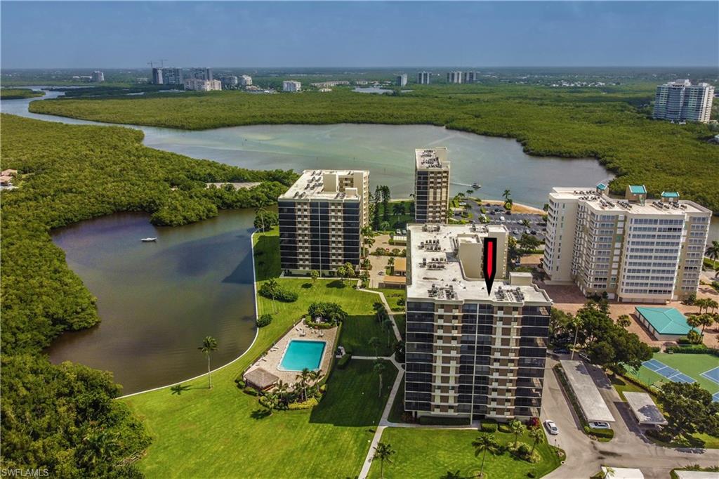 11 Bluebill Avenue, Unit 1101 Naples, FL 34108 - Photo 4 of 40 an aerial view of a city with houses